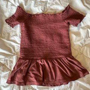 A maroon, ribbed, off the shoulder blouse!